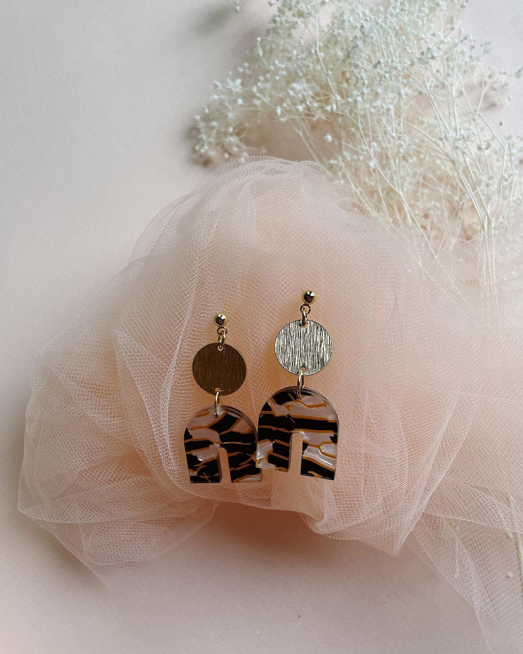 Black, gold, white dangle